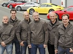 Sprenger (second left) and the Porsche team
