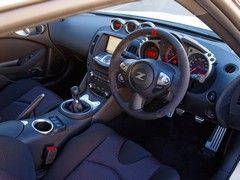 Alcantara and (clearly faster) red stitching feature