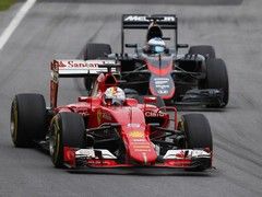 Vettel passes a frustrated Alonso