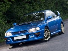 Flared arches set it apart from Impreza crowd