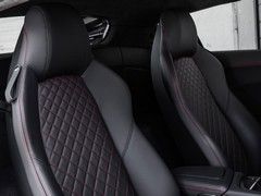 Power seats on standard, fixed-back for Plus