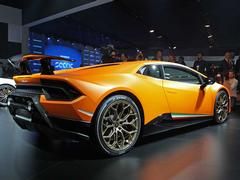 It's a Lambo, of course it's orange with gold wheels